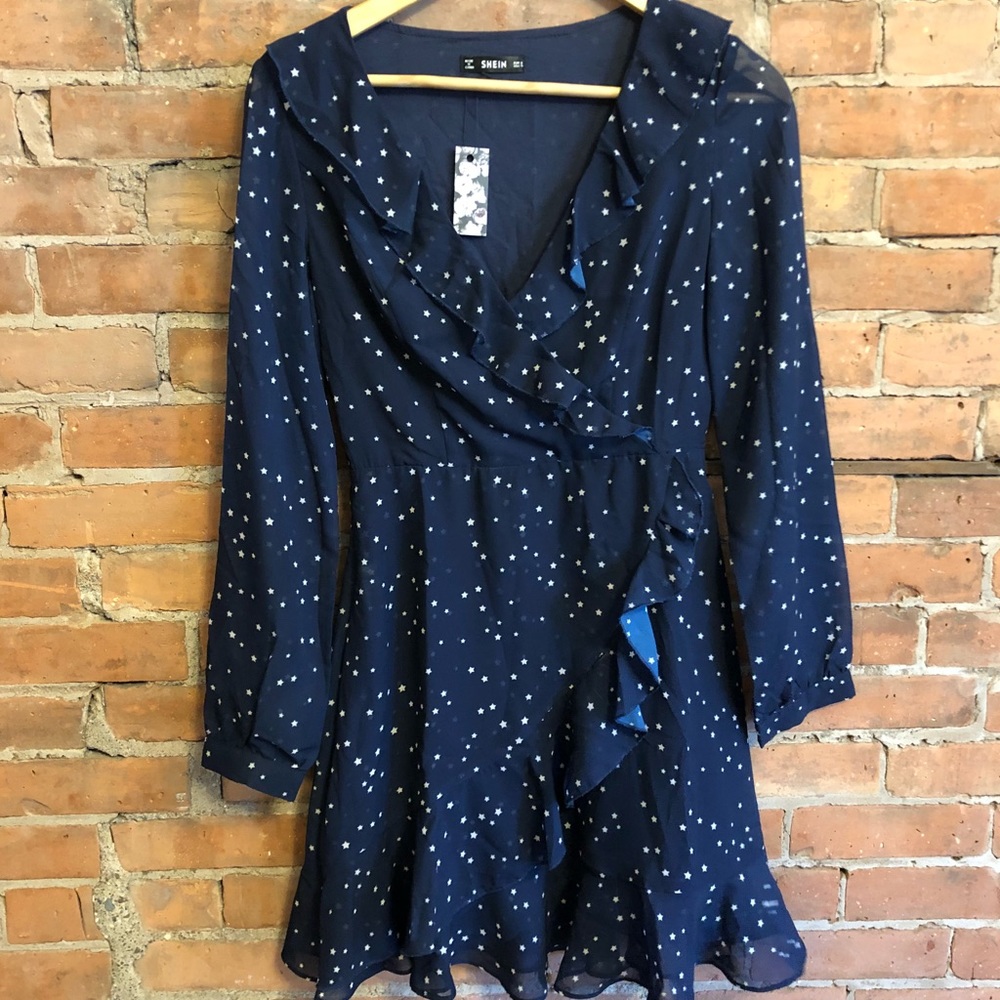 Navy frilled wrap dress with stars